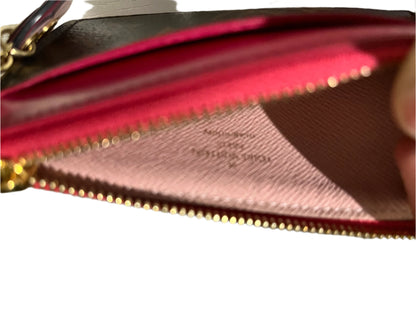 Louis Vuitton mini wallet with charm